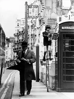 Lapworth: Berry Lapworth reads his comic high up on his unicycle