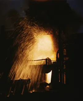 Silicon: Bessemer converter removed impurities from ?
