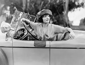 Compson: Betty Compson at the wheel of a car, 1921