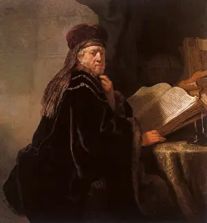 1634: Biblical Figure at a Study Desk, by Rembrandt