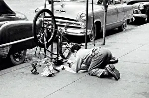 Rizzuto: bicycle - man - repairing - accuracy