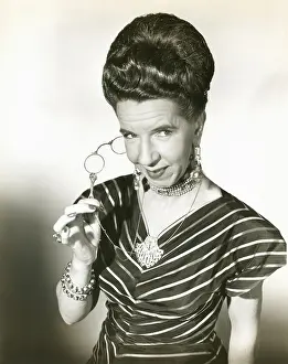 Lorgnette: Big hair -