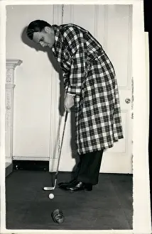 15000: Billy Graham, American evangelist, relaxing in Glasgow