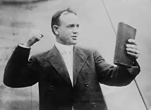 One Person: Billy Sunday, Presbyterian evangelist, posed as