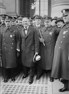 Double Breasted: Billy Sunday surrounded by police on his arrival