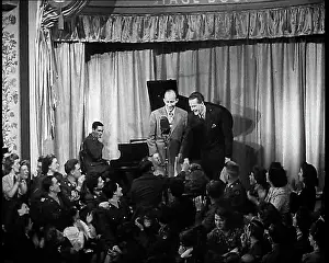Servicemen: Bing Crosby and Jack Buchanon Performing On