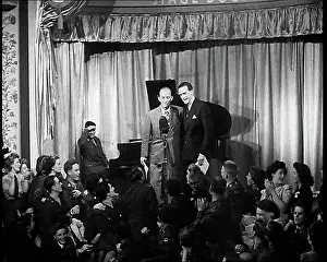 Servicemen: Bing Crosby and Jack Buchanon Performing On