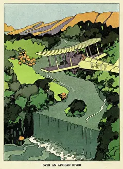 Aviation: Biplane over an African river