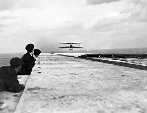 Argus: Biplane coming in to land on HMS Argus, WW1