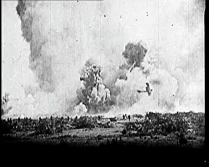 Explosions: Biplane Flying Low Past Massive Bomber Explosions