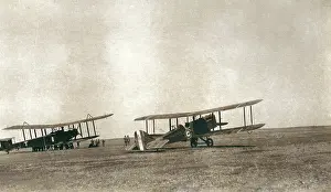 Sepia Images: Two biplanes in the desert, Iraq