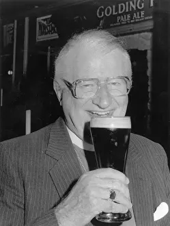 Golding: Bishop of Truro enjoying a pint of beer, Redruth, Cornwall