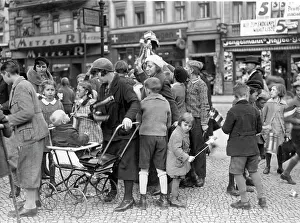 Borough: Bismarck Youth distributing black-white-red flags, 1932