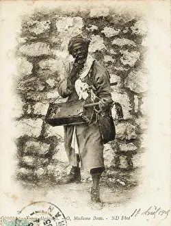 Busking: Black Algerian Musician