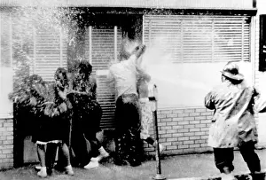 Hosed: Black Americans being hosed by police and ?