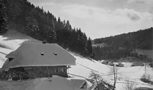 Blasien: Black Forest house in snow