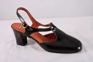 Jonquil: Black patent slingback shoe