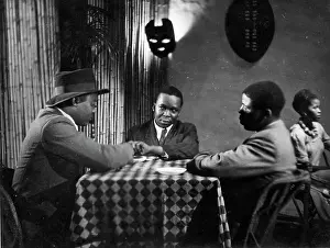 Ngoma: Black and white image of three tsotsis in nightclub