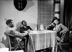 Ngoma: Black and white image of three tsotsis in nightclub