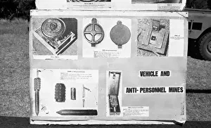 Zanu: Black and white photo of munitions display at
