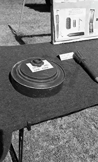 Landmine: Black and white photo of munitions display at