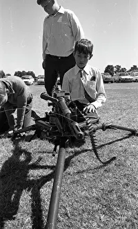 Zanu: Black and white photo of young boys looking at