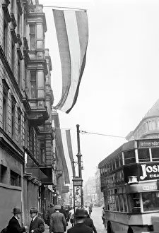 Combination: Black-white-red flags hanging on the Scherlhaus, 1932