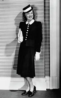 Fleecing: A black wool suit designed by Dolly Tree