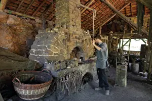 Novo: Blacksmith in the forge, Chateau de Guedelon
