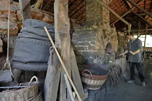 Novo: Blacksmith in the forge, Chateau de Guedelon