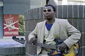 Guitarists: Blind slide guitar player
