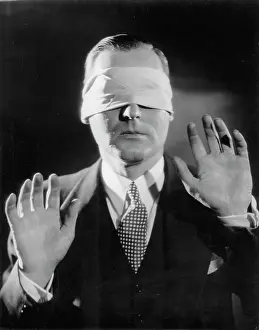 Helpless: Blindfolded man