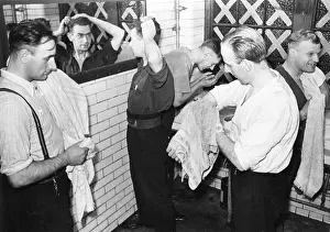 Washroom: Blitz in London -- AFS firefighters getting cleaned up, WW2