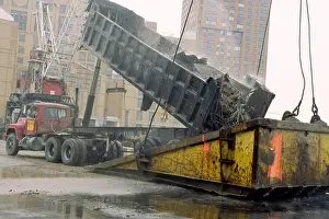 Cleanup: A few blocks from Ground Zero a truck dumps ?