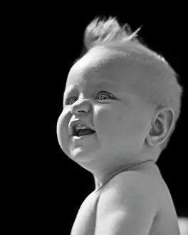 Gums: Blond Baby Funny Facial Expression