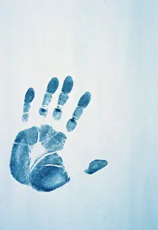 Ninties: Blue hand print on white wall