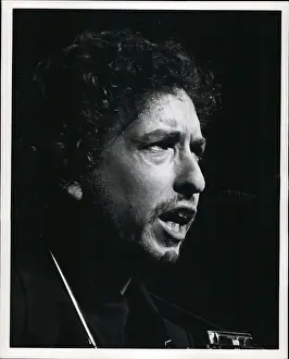 Dylan: Bob Dylan, American folk singer, performing