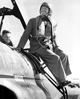 Boblbd: Bob Hope climbing out of a T-33 jet during ?
