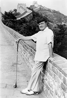 Taped: Bob Hope posing by Great wall of China with ?