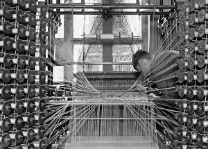 Apprentice: Bobbins in a loom, 1931