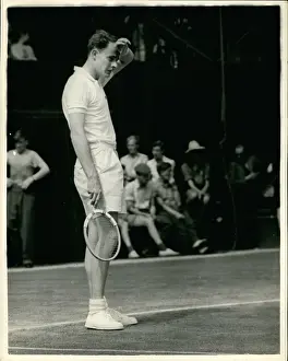 Wipes: Bobby Wilson in tennis match at Wimbledon