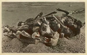 Cremated: Bodies awaiting cremation on a Funeral Pyre - India