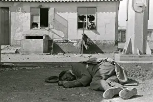 Assegais: The body of a man, killed in the political unrest