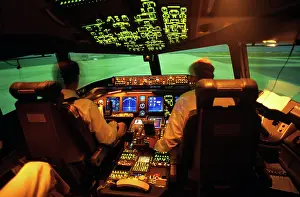 Smt001: Boeing 777 Two Men Pilots in Flight Simulator Man Pilot