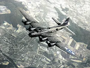 B17f: Boeing B-17F (forward view) aloft from above of 42303.?