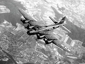 B17f: Boeing B-17F (forward view) aloft from above of 42303