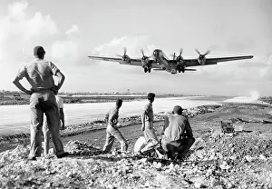 B 29: Boeing B-29 (forward view) climbing out of Saipan, Dec