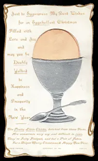 Eggcup: Boiled egg with comic verse on a Christmas card