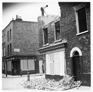 Scaffolding: BOMBED FRUIT SHOP