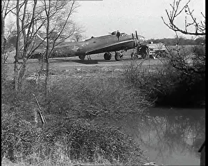Undergoing: A Bomber Aircraft is Undergoing Maintenance